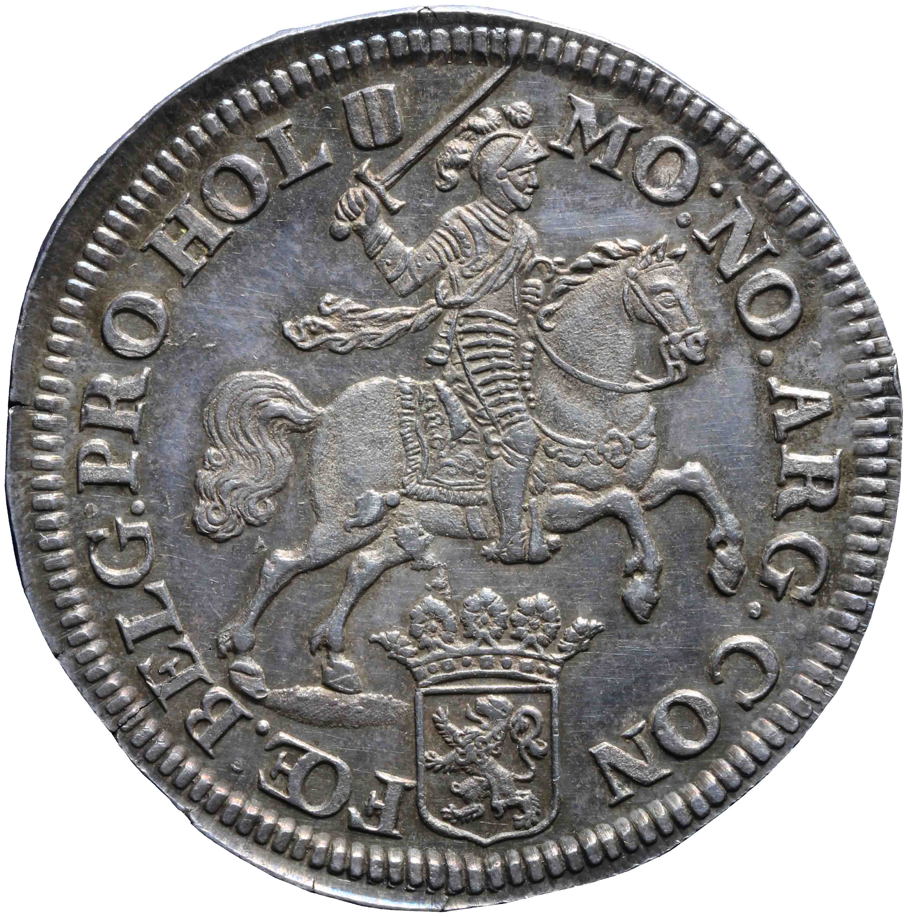 Afbeelding van de voorzijde. zilveren rijder of dukaton. Inventarisnummer:1955-0027