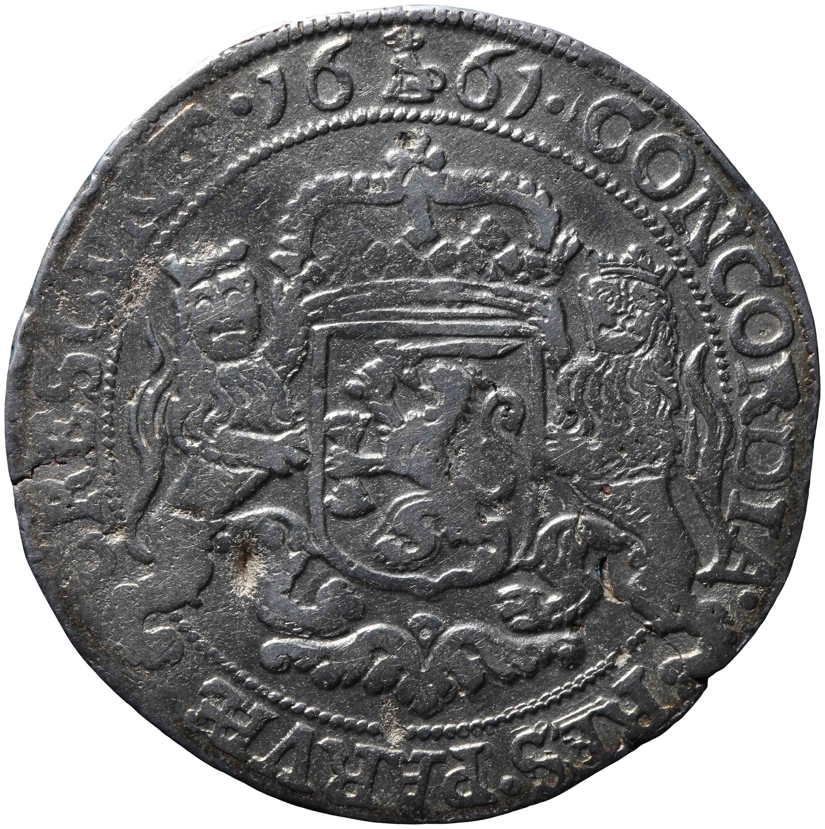 Afbeelding van de keerzijde. halve zilveren rijder of halve dukaton. Inventarisnummer:HNM-00269