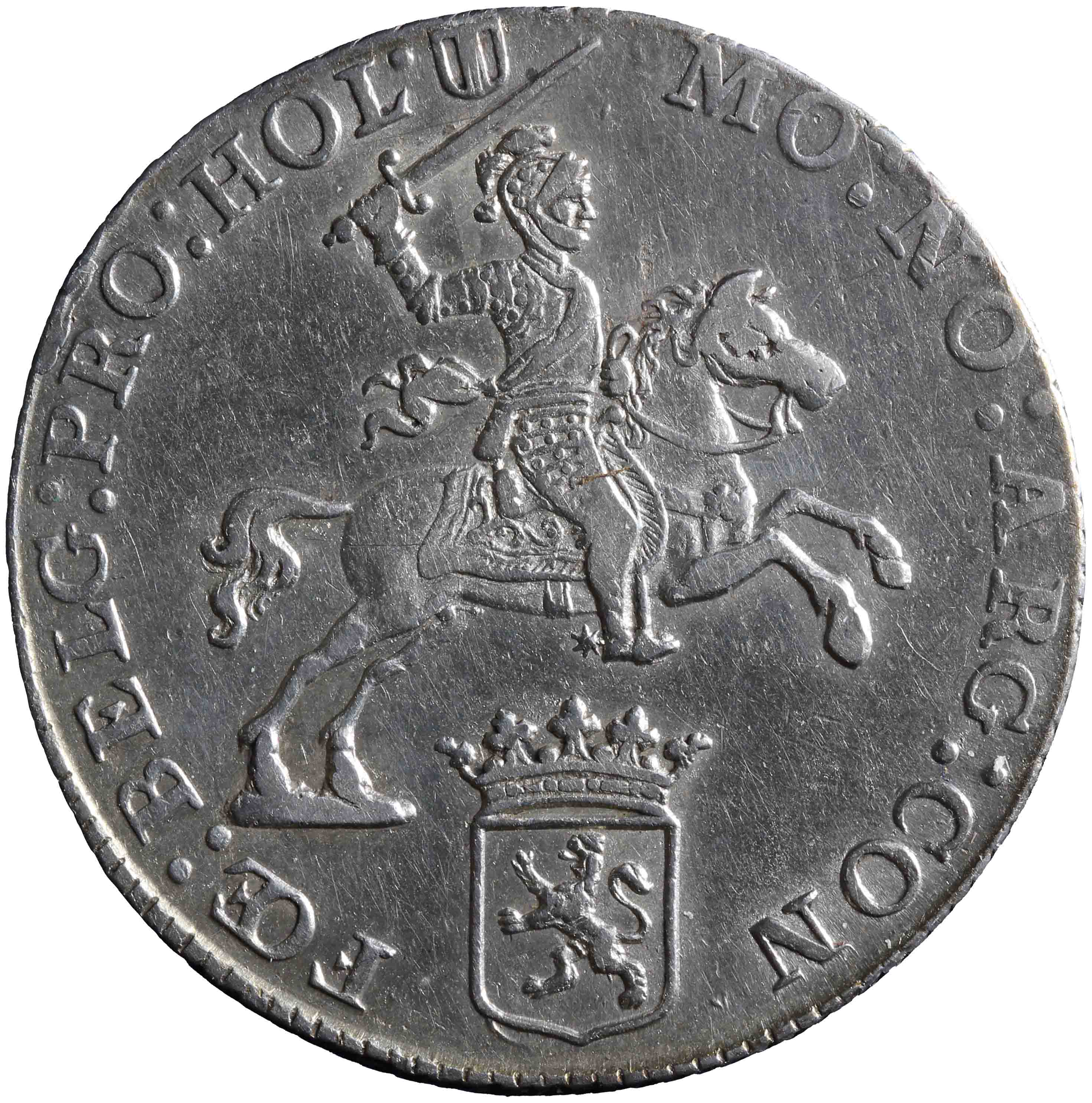 Afbeelding van de voorzijde. halve zilveren rijder of halve dukaton. Inventarisnummer:HNM-01573