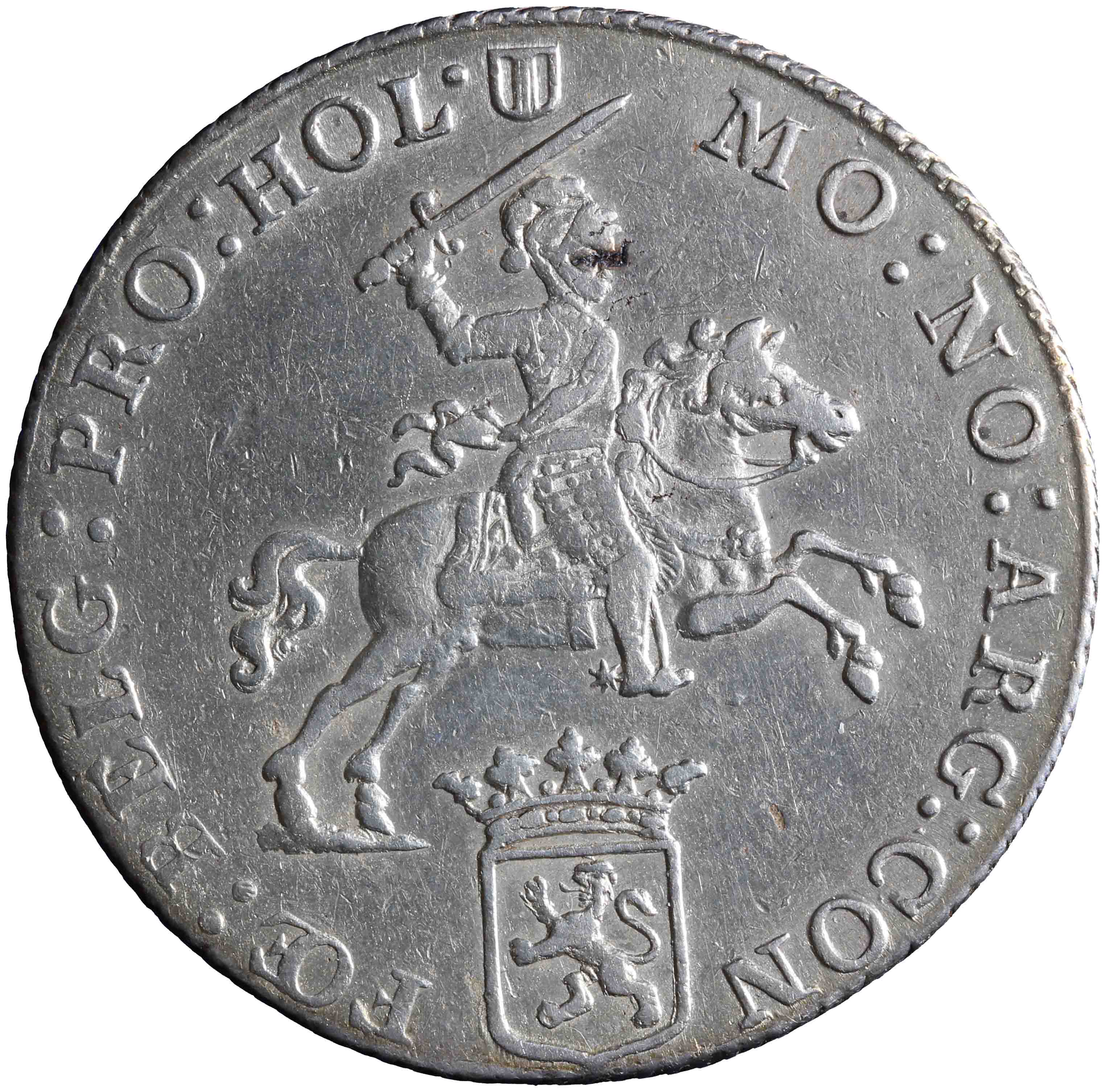 Afbeelding van de voorzijde. halve zilveren rijder of halve dukaton. Inventarisnummer:HNM-01576