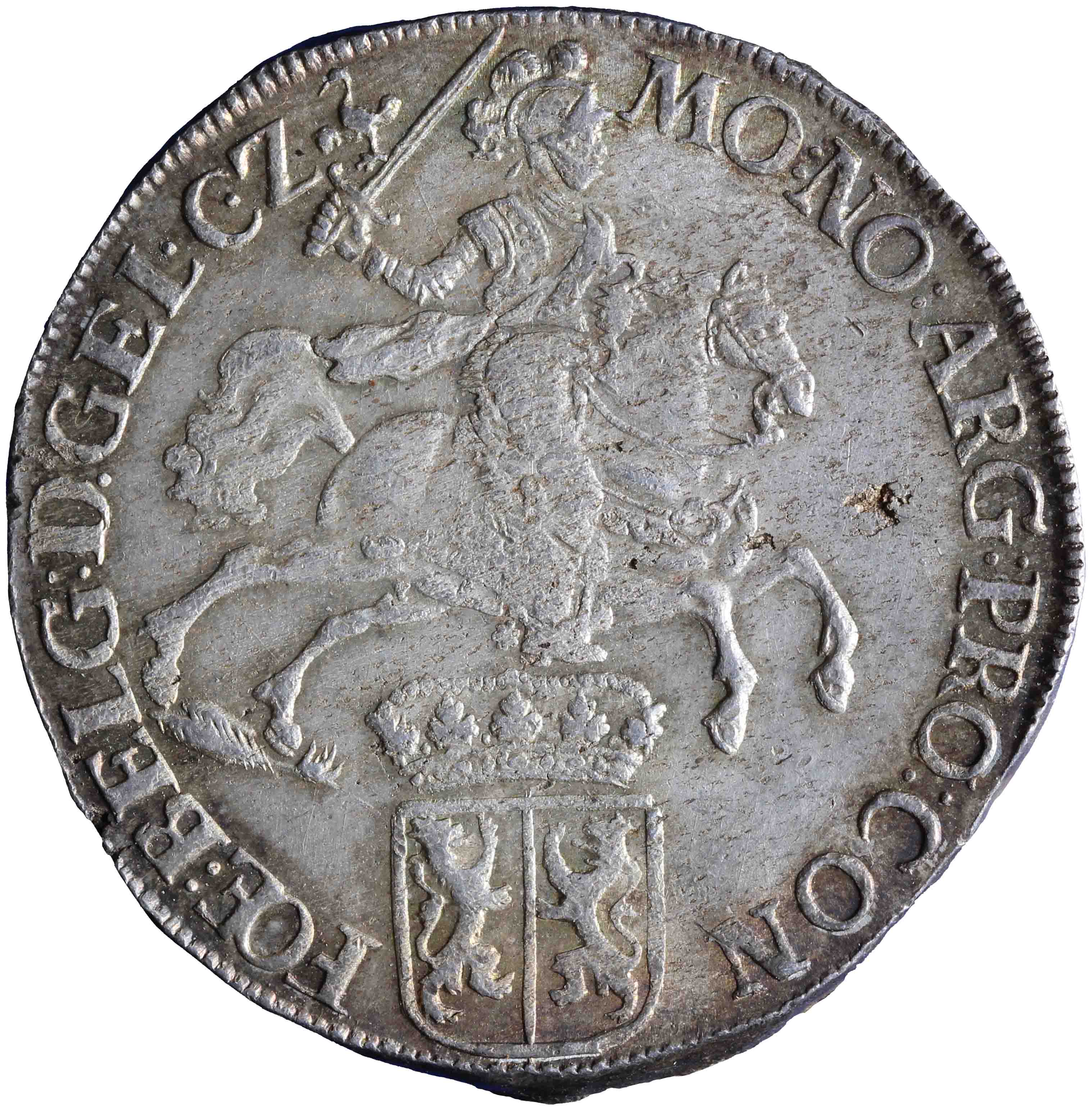 Afbeelding van de voorzijde. zilveren rijder of dukaton. Inventarisnummer:NM-01187