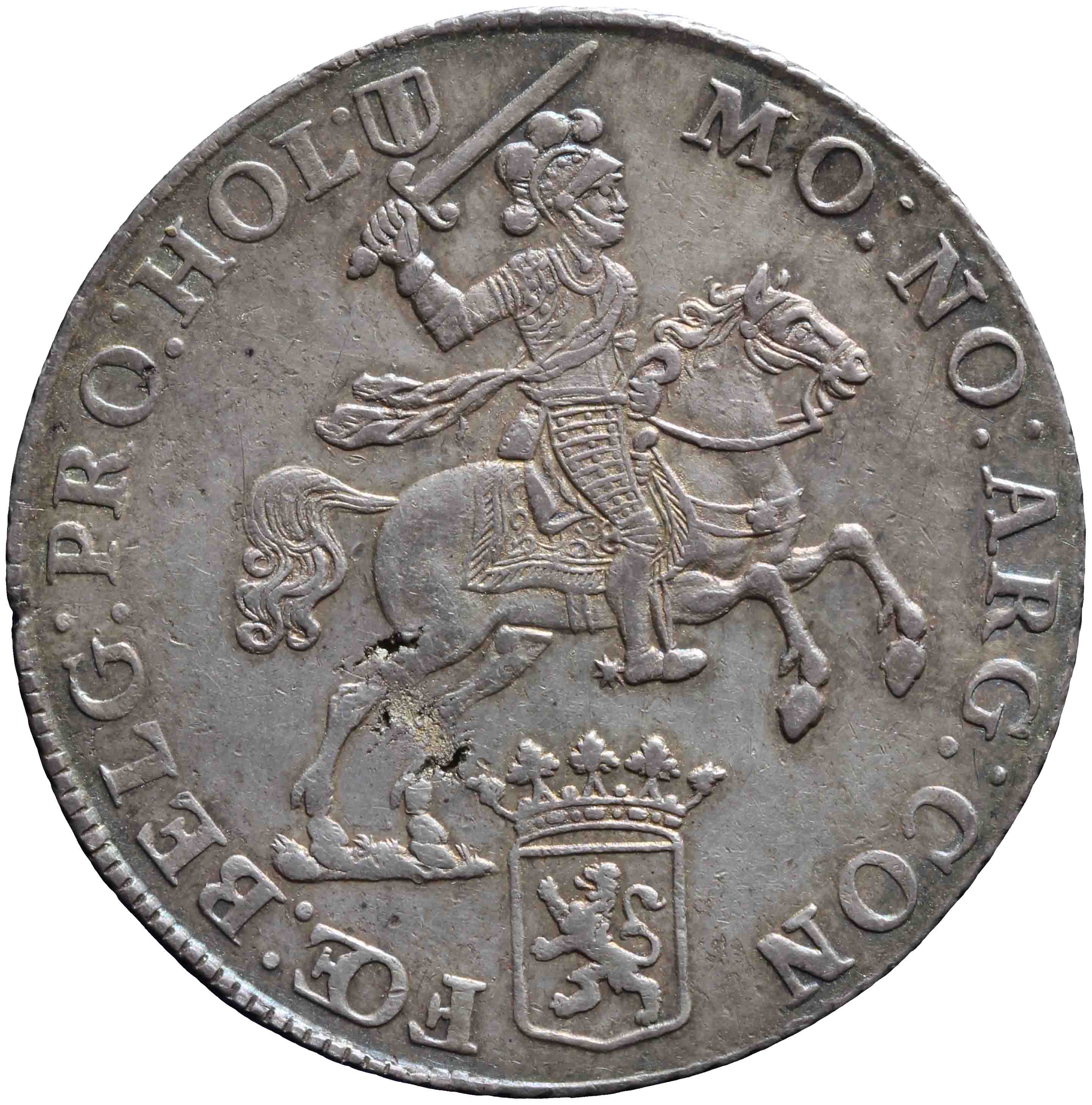 Afbeelding van de voorzijde. zilveren rijder of dukaton. Inventarisnummer:NM-03637
