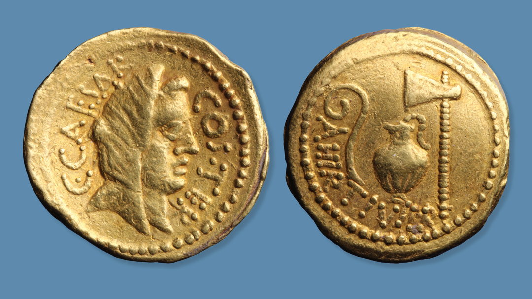Gouden munt van Julius Caesar, geslagen in Rome, 46 v.Chr.  Op de voorzijde staat het hoofd van Vesta, beschermer van het Romeinse volk. Op de keerzijde attributen die horen bij het priesterschap. Caesar was ook opperpriester (pontifex maximus) van de Romeinen.